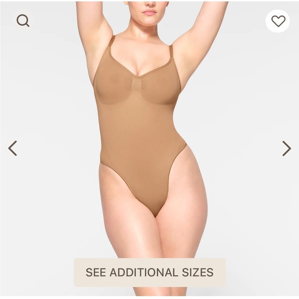 SKIMS Seamless Thong Sculpt Bodysuit in a‎ light TAN color Sz L/XL